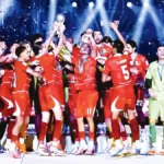 kapten-indonesia-kevin-dick-mengangkat-trofi-juara-fifa-asean-cup-2026-saat-melakukan-selebrasi-bersama-rekannya-di-stadion-utama-gelora-bung-karno-senayan-jakarta-senin-5102026-ig-persija-KB9o6